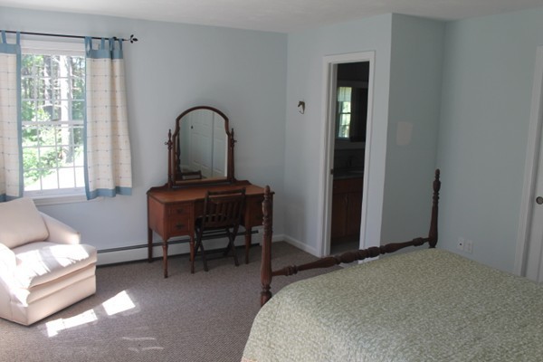 103 Wapping Road Kingston, MA 02364 - Photo 14 of 30 a bedroom with a bed and a window