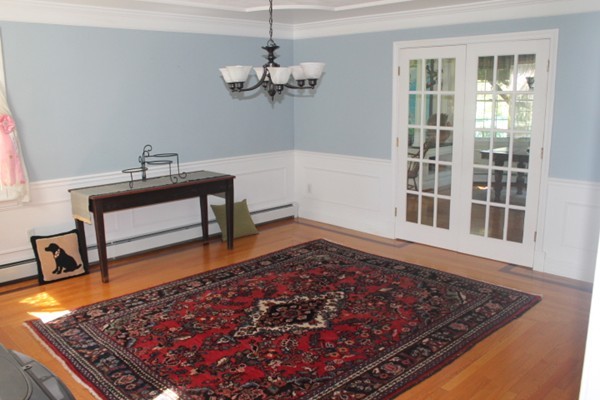 103 Wapping Road Kingston, MA 02364 - Photo 23 of 30 a living room with a rug