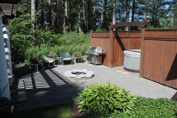 103 Wapping Road Kingston, MA 02364 - Photo 26 of 30 a view of a backyard with sitting area