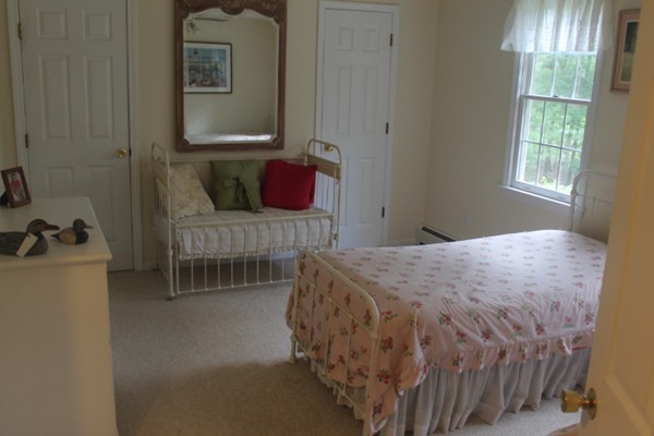 103 Wapping Road Kingston, MA 02364 - Photo 29 of 30 a bedroom with a bed and a window