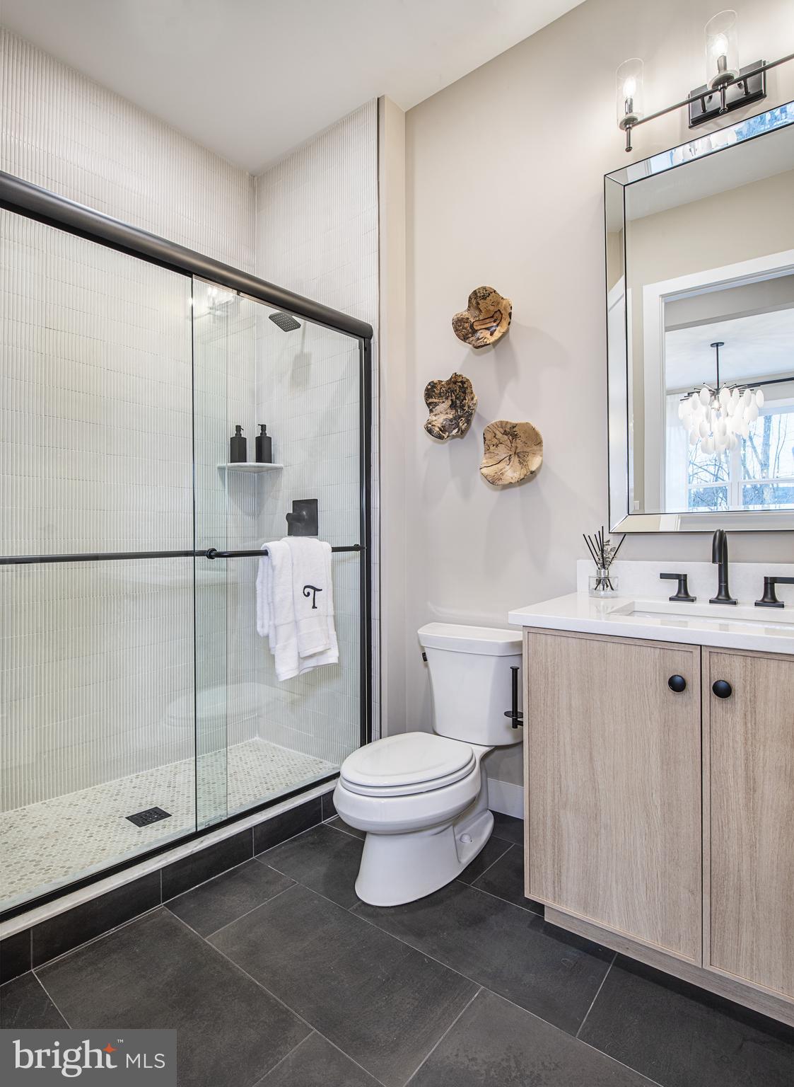 Stony Road, Unit ROLLINS Warminster, PA 18974 - Photo 8 of 15 a bathroom with a toilet sink and shower