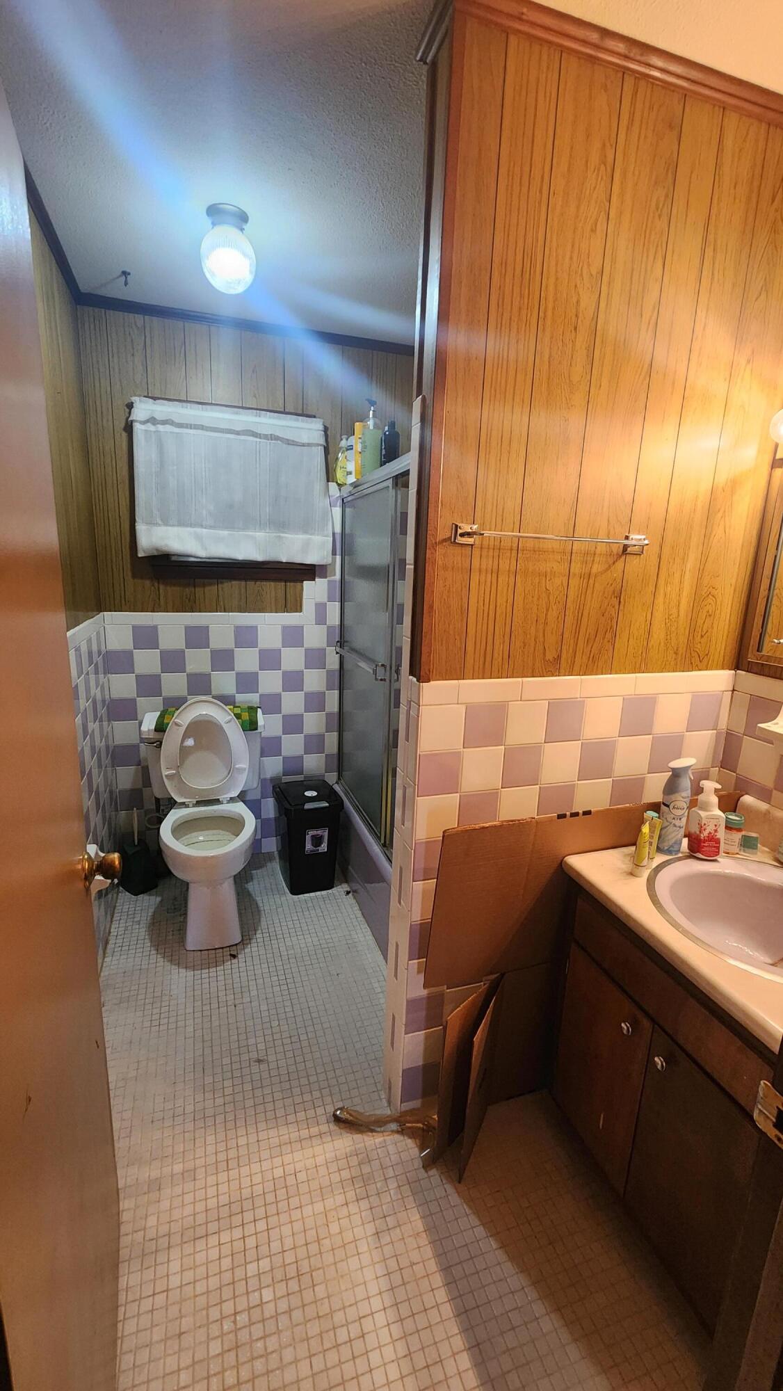 6127 Barnes Road Crestview, FL 32536 - Photo 12 of 16 a bathroom with a sink and a toilet