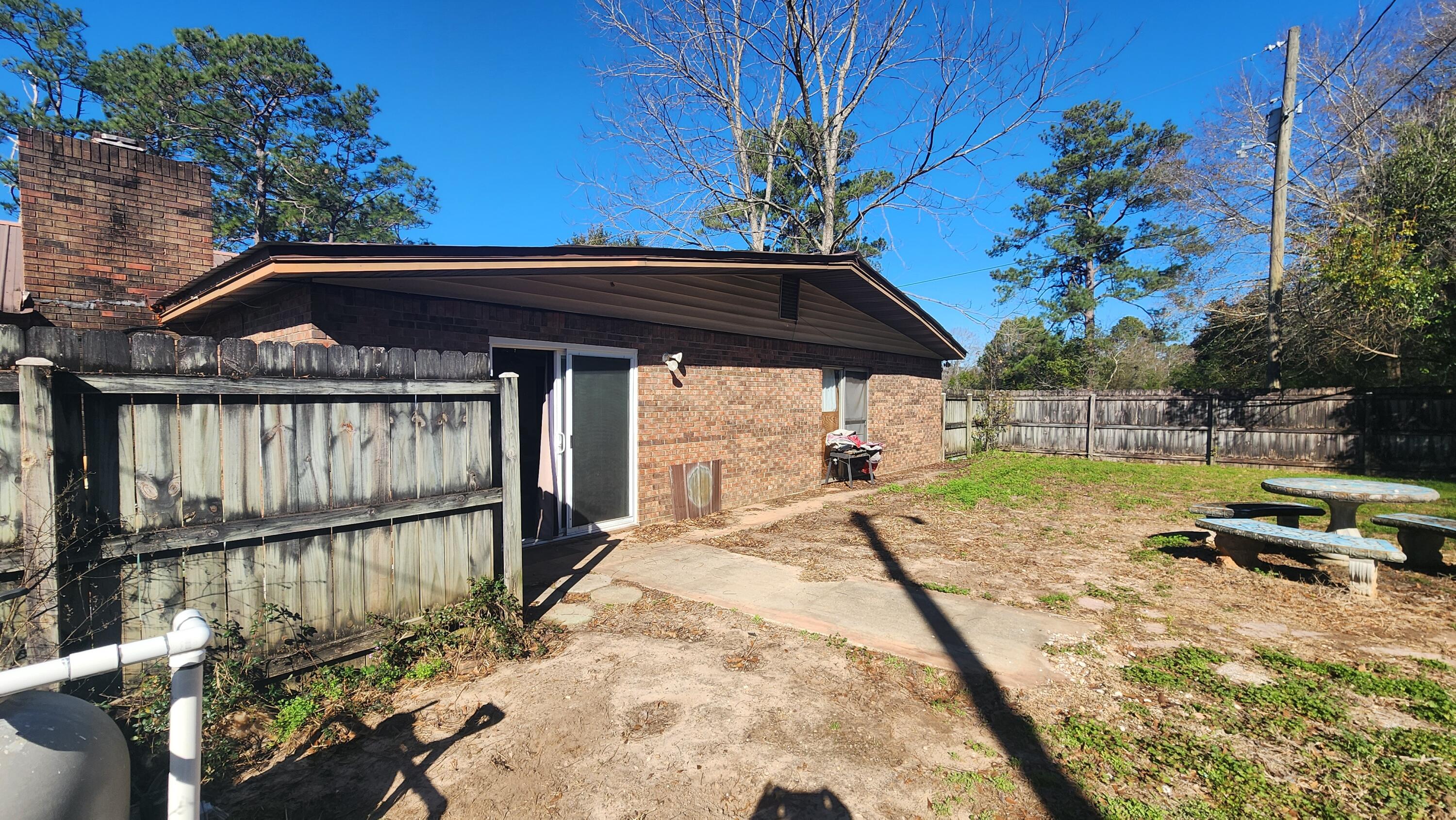 6127 Barnes Road Crestview, FL 32536 - Photo 7 of 16 a view of a swimming pool with a patio