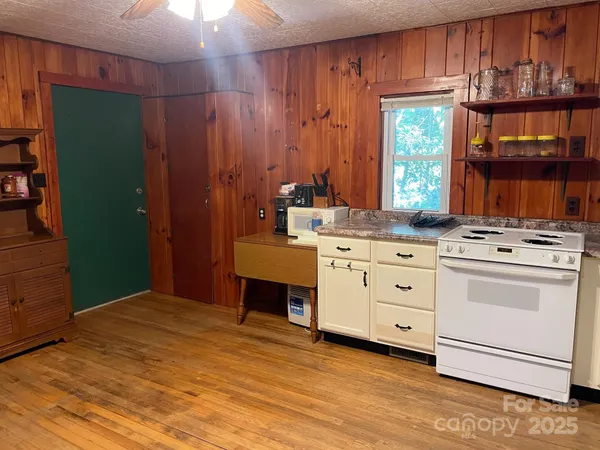 a room with cabinets and a window