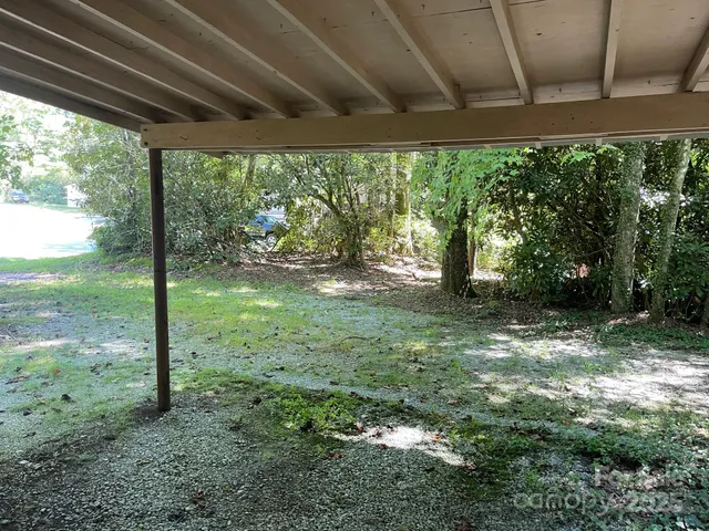 a view of a backyard with garden