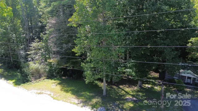 a wooden bench sitting in front of a house