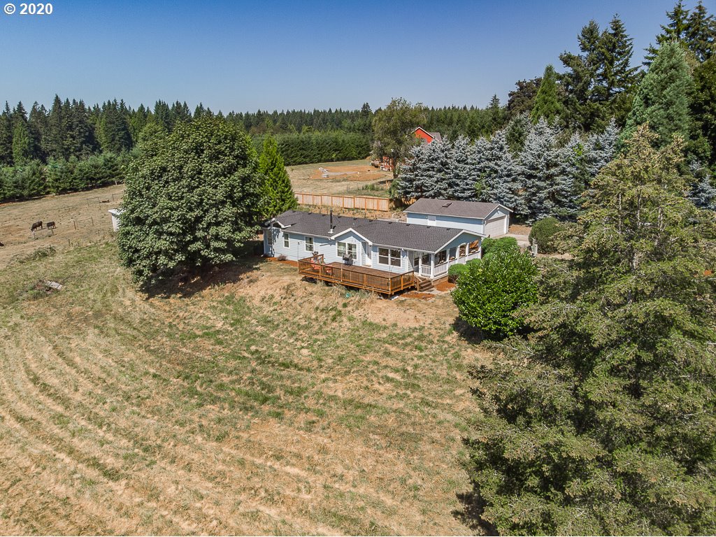 34148 Southeast Jarl Road Boring, OR 97009 - Photo 2 of 32 a view of a lake with a city