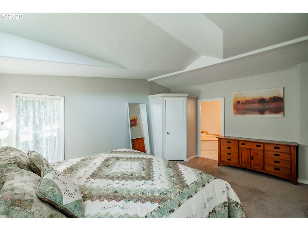 34148 Southeast Jarl Road Boring, OR 97009 - Photo 29 of 32 a bedroom with a bed dresser and a window