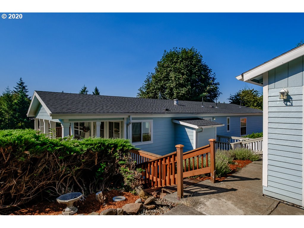 34148 Southeast Jarl Road Boring, OR 97009 - Photo 8 of 32 a view of house with outdoor seating area