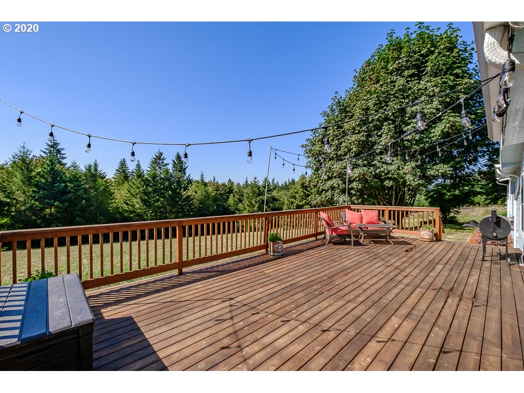 34148 Southeast Jarl Road Boring, OR 97009 - Photo 10 of 32 a view of balcony with wooden floor and seating space