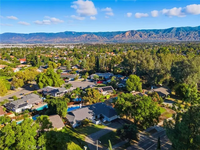 a view of a house with a swimming pool