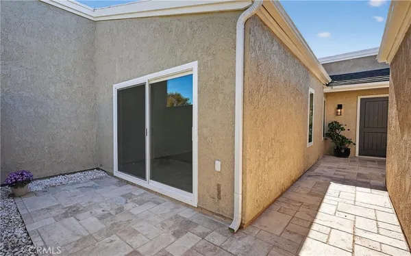 a view of hallway with walk in closet