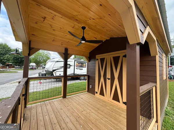 a view of swimming pool with seating space