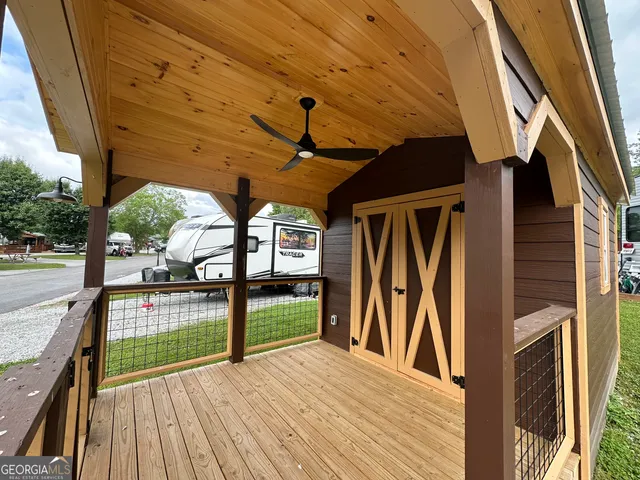 a view of swimming pool with seating space