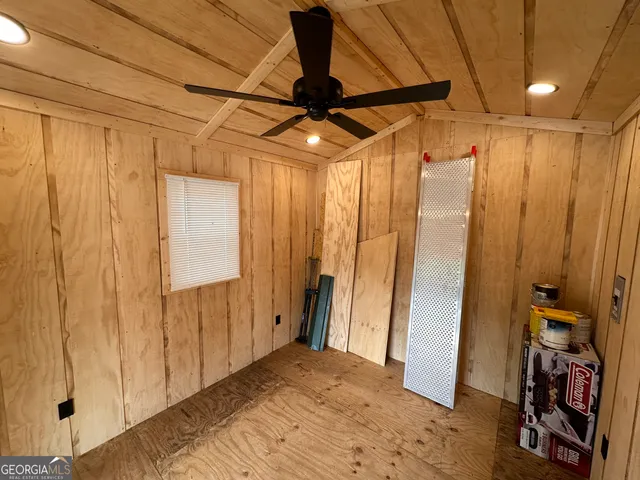 a view of a balcony with wooden floor
