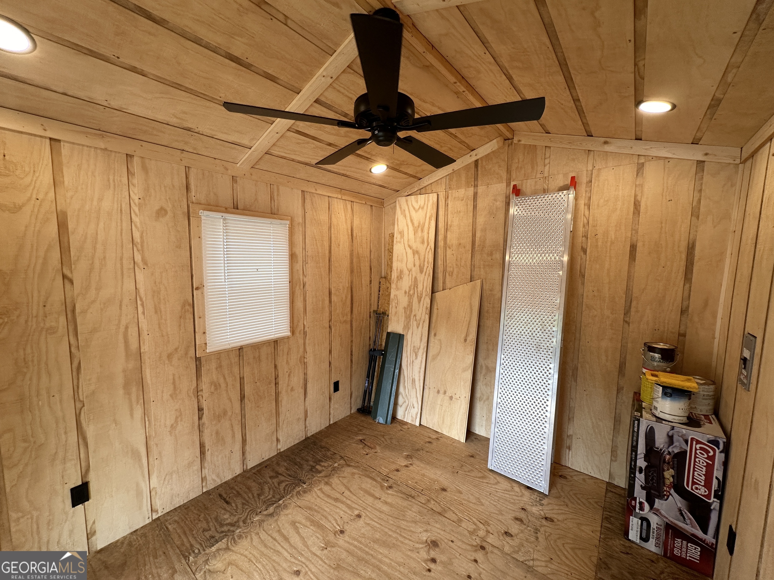 41 Monaco Lane Dillard, GA 30537 - Photo 8 of 16 a view of a hallway with closet and wooden floor