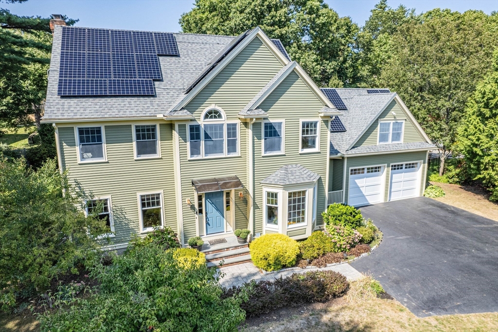 5 Chapel Hill Road Beverly, MA 01915 - Photo 2 of 41 a front view of a house with a yard