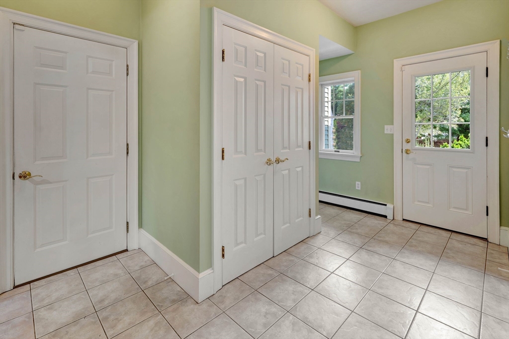 5 Chapel Hill Road Beverly, MA 01915 - Photo 21 of 41 a view of a livingroom with an empty space and a window