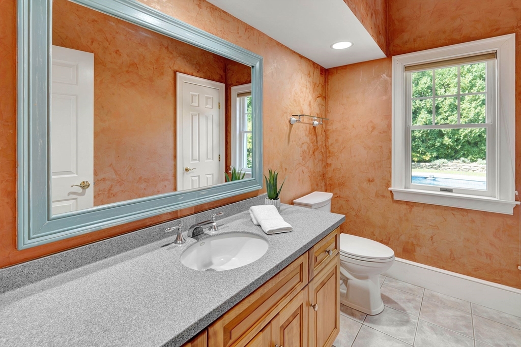 5 Chapel Hill Road Beverly, MA 01915 - Photo 31 of 41 a bathroom with a granite countertop sink toilet and shower