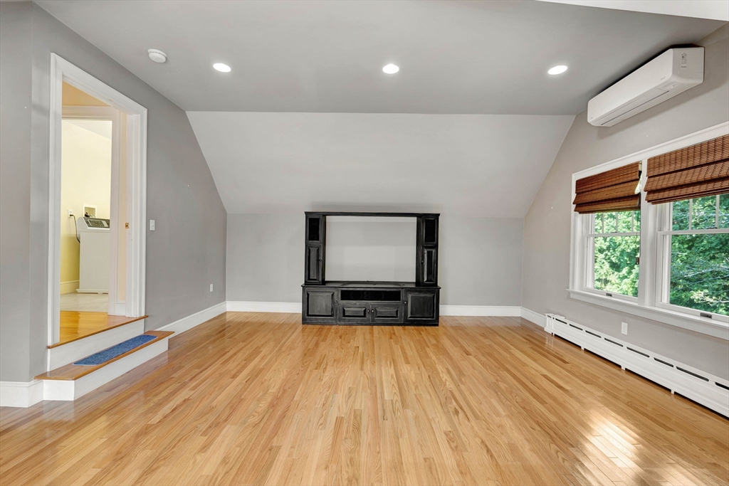 5 Chapel Hill Road Beverly, MA 01915 - Photo 34 of 41 a view of empty room with wooden floor and fan