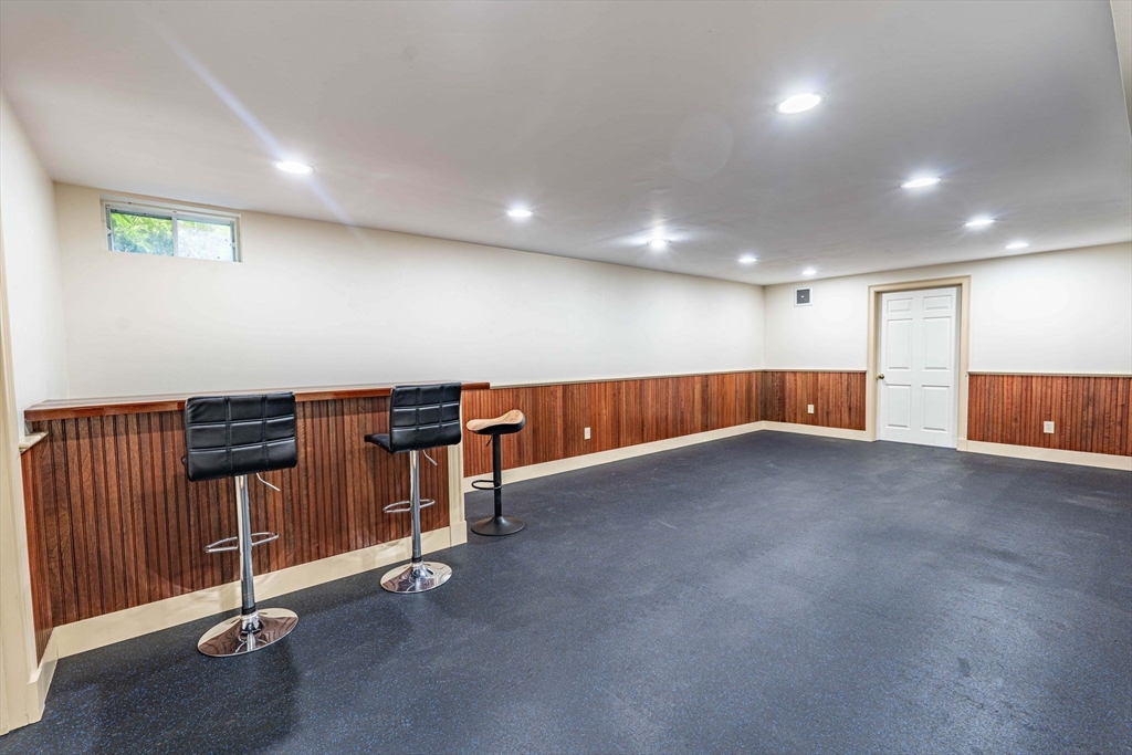 5 Chapel Hill Road Beverly, MA 01915 - Photo 38 of 41 a view of an empty room with gym equipment