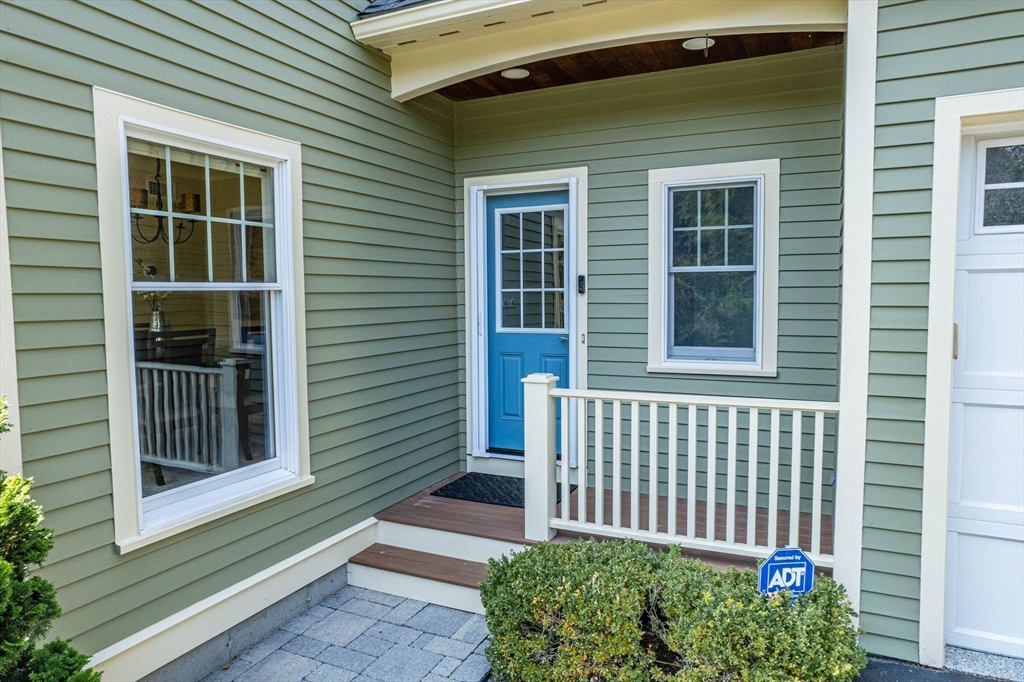 5 Chapel Hill Road Beverly, MA 01915 - Photo 4 of 41 a view of a house with a small yard