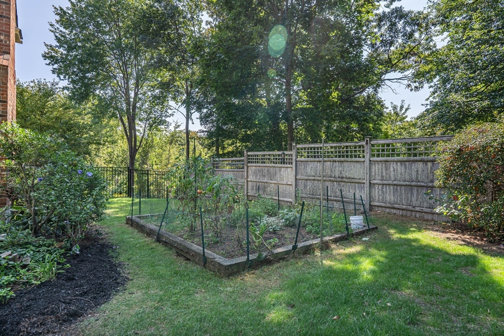 5 Chapel Hill Road Beverly, MA 01915 - Photo 9 of 41 a view of a backyard with a garden