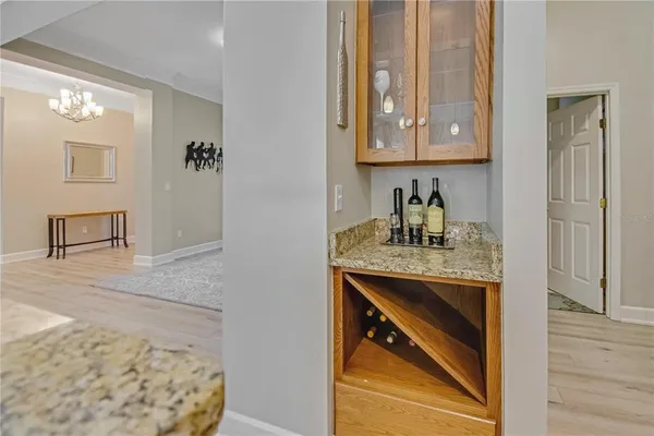 a view of cabinets and wooden floor