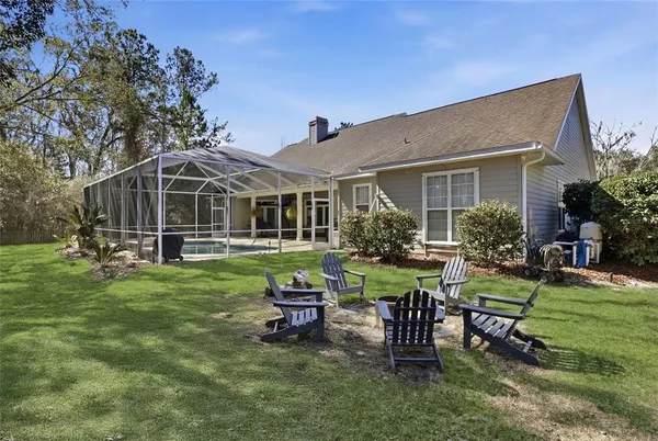 a view of outdoor space with deck and tree