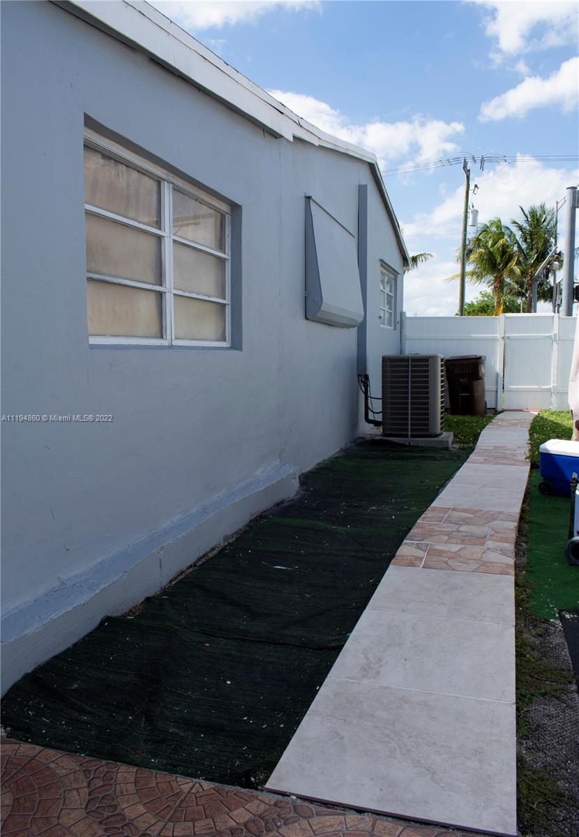 398 East 56th Street Hialeah, FL 33013 - Photo 29 of 30 a view of backyard with outdoor seating