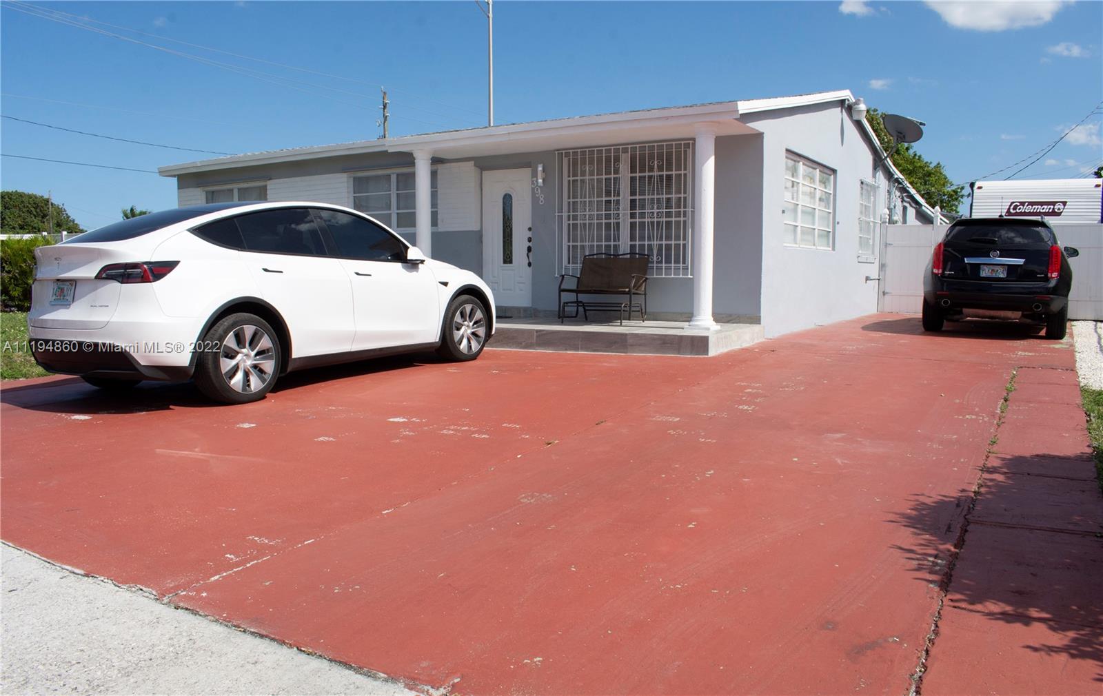 398 East 56th Street Hialeah, FL 33013 - Photo 30 of 30 a view of a car garage