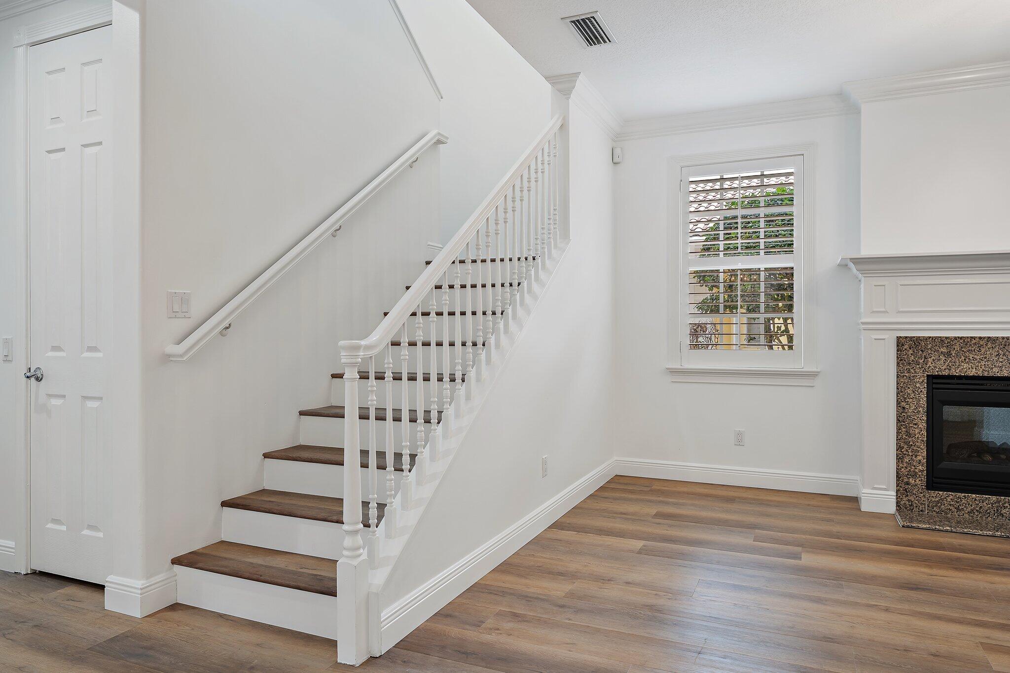 242 San Remo Drive Jupiter, FL 33458 - Photo 28 of 54 Staircase to second floor