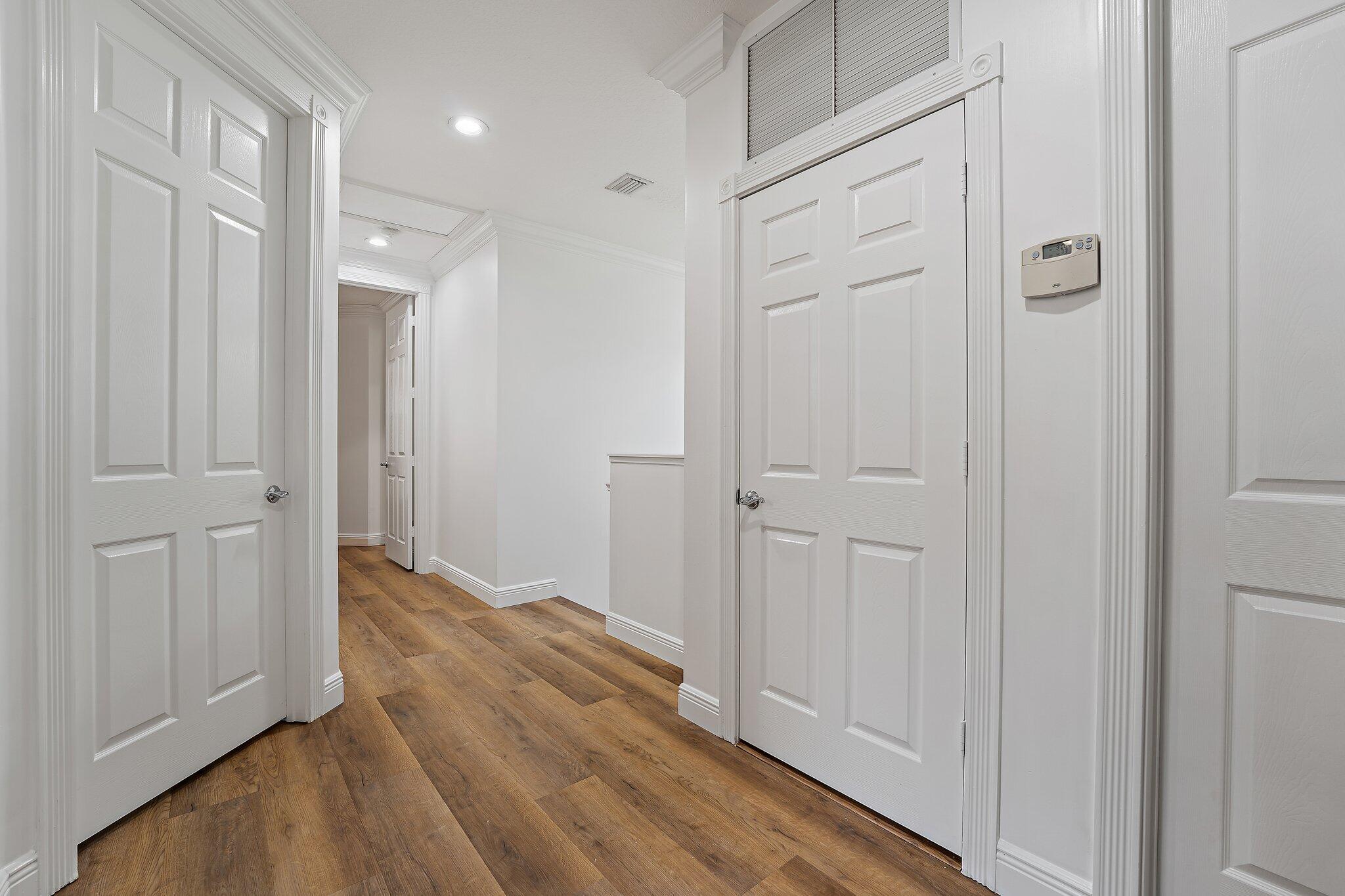 242 San Remo Drive Jupiter, FL 33458 - Photo 34 of 54 Upstairs Hallway