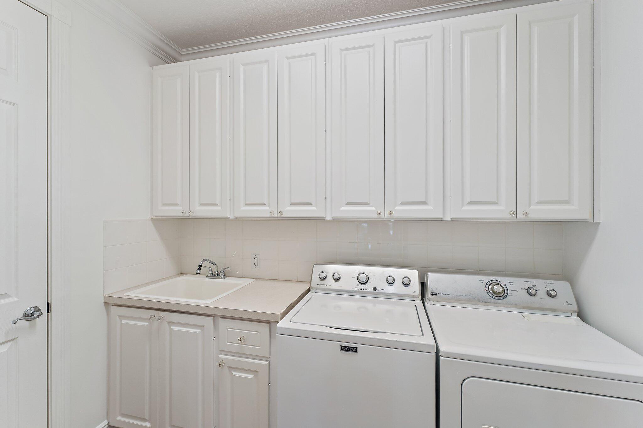 242 San Remo Drive Jupiter, FL 33458 - Photo 45 of 54 Laundry Room
