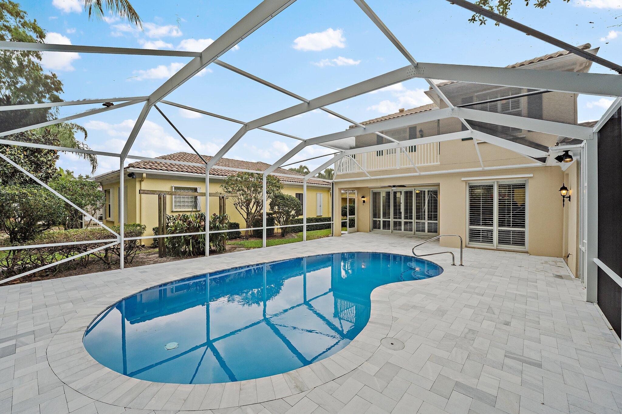 242 San Remo Drive Jupiter, FL 33458 - Photo 48 of 54 Salt Water Pool