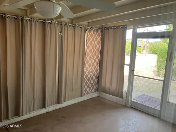a view of a room with a large window
