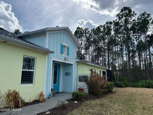 a view of a house with a patio
