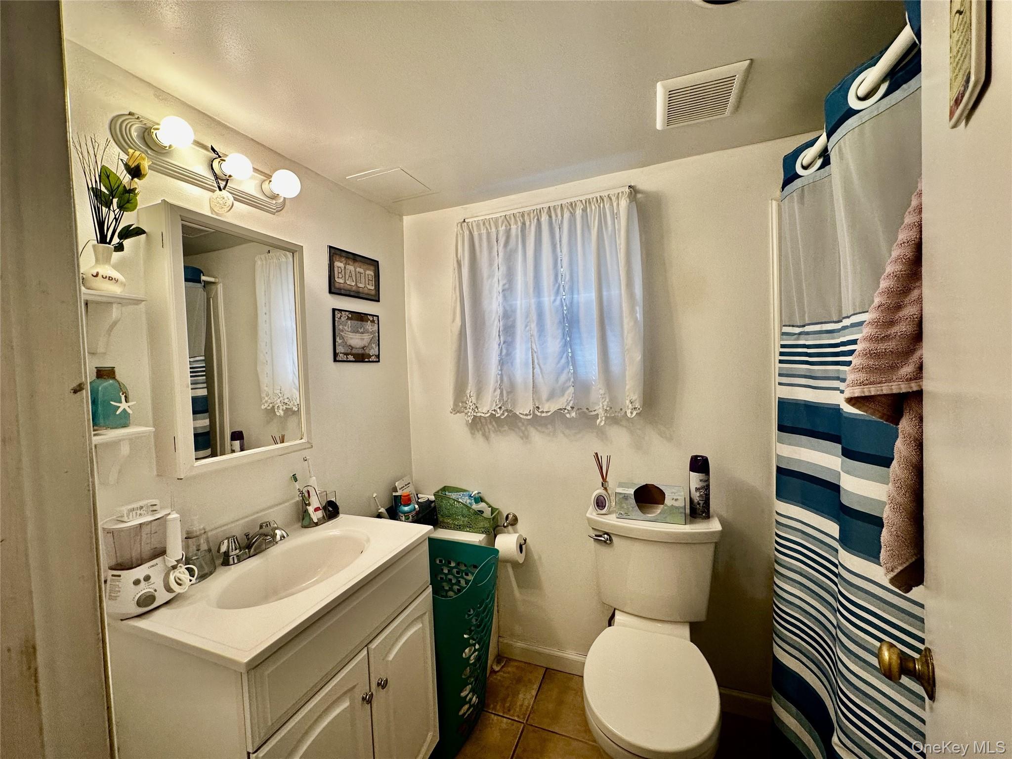 4 Jay Street Stony Point, NY 10980 - Photo 16 of 21 a bathroom with a sink toilet and shower