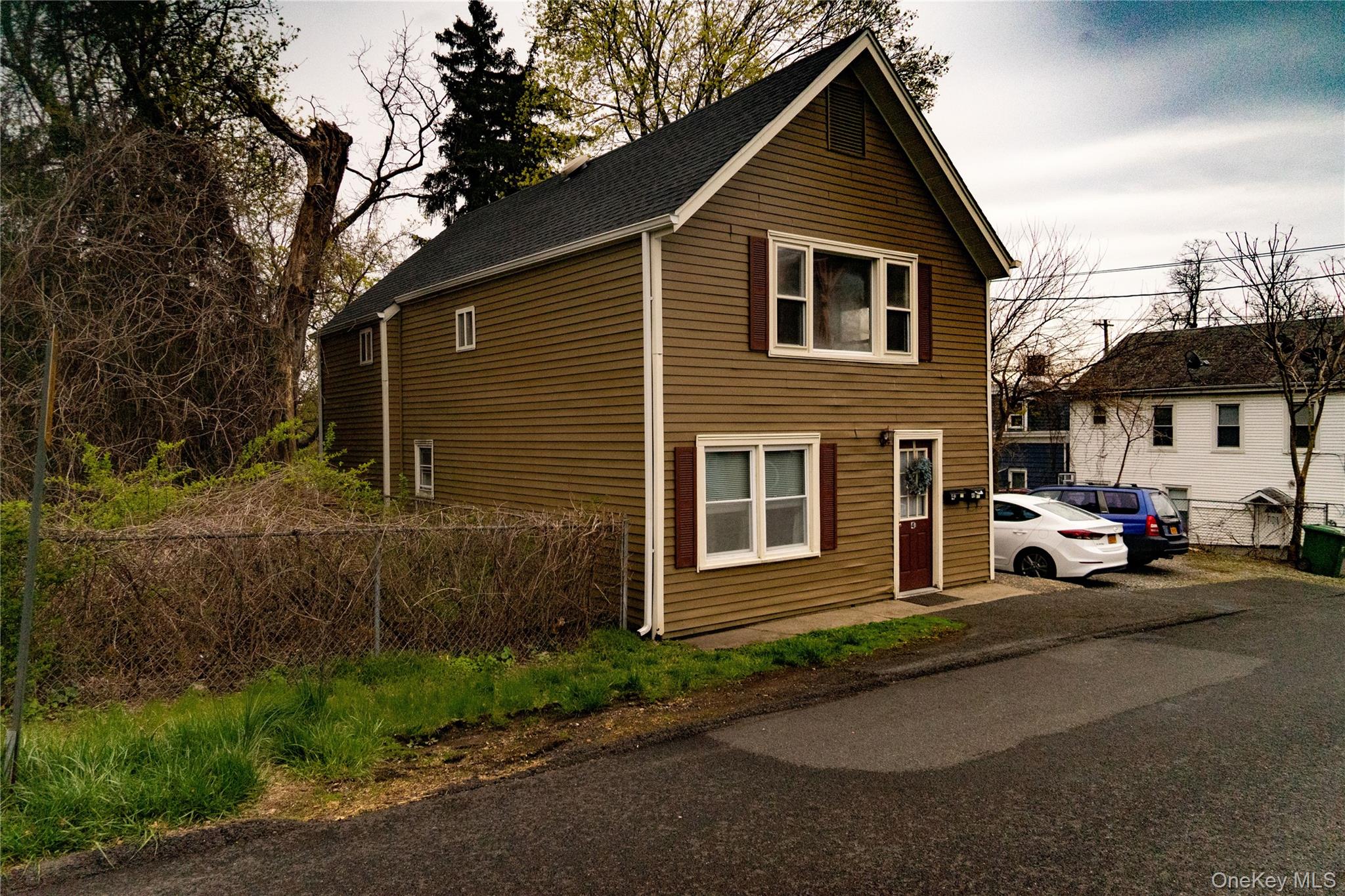 4 Jay Street Stony Point, NY 10980 - Photo 2 of 21 a front view of a house with a yard and garage