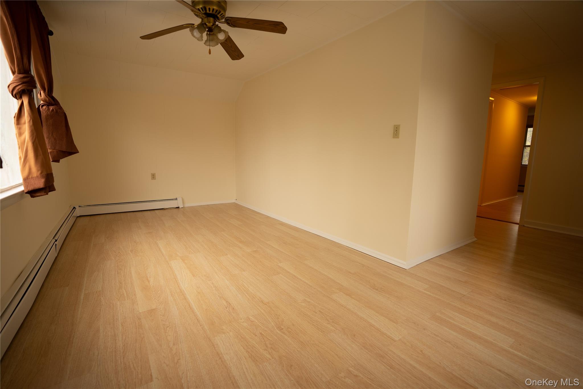 4 Jay Street Stony Point, NY 10980 - Photo 4 of 21 a view of a room with wooden floor and a ceiling fan