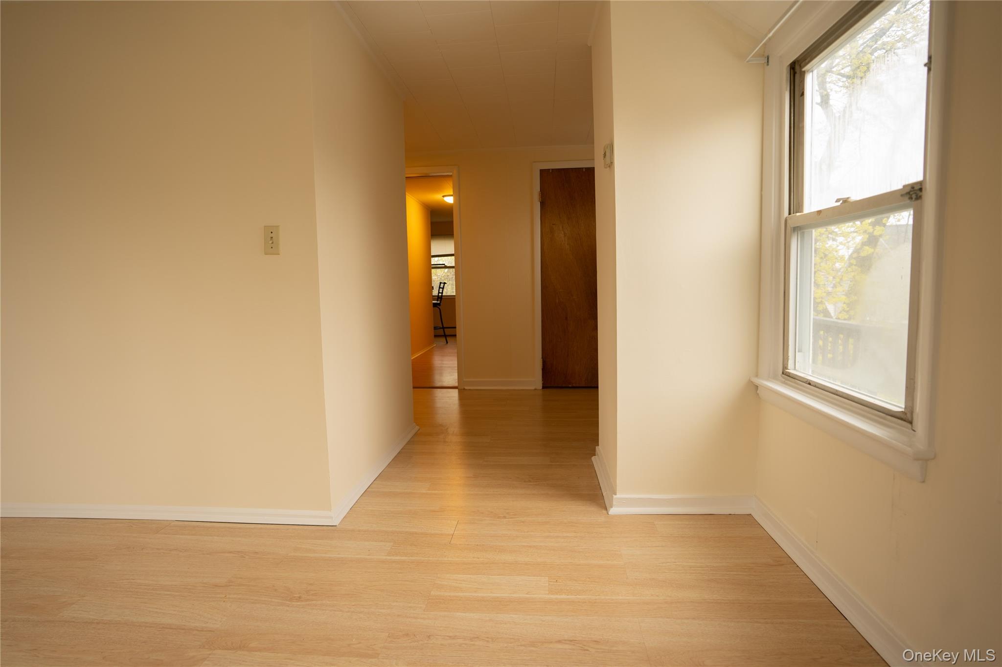 4 Jay Street Stony Point, NY 10980 - Photo 5 of 21 a view of empty room with wooden floor and windows
