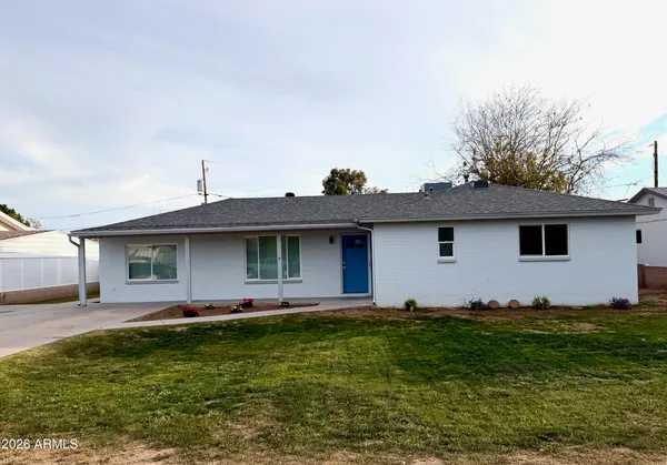 a front view of house with yard