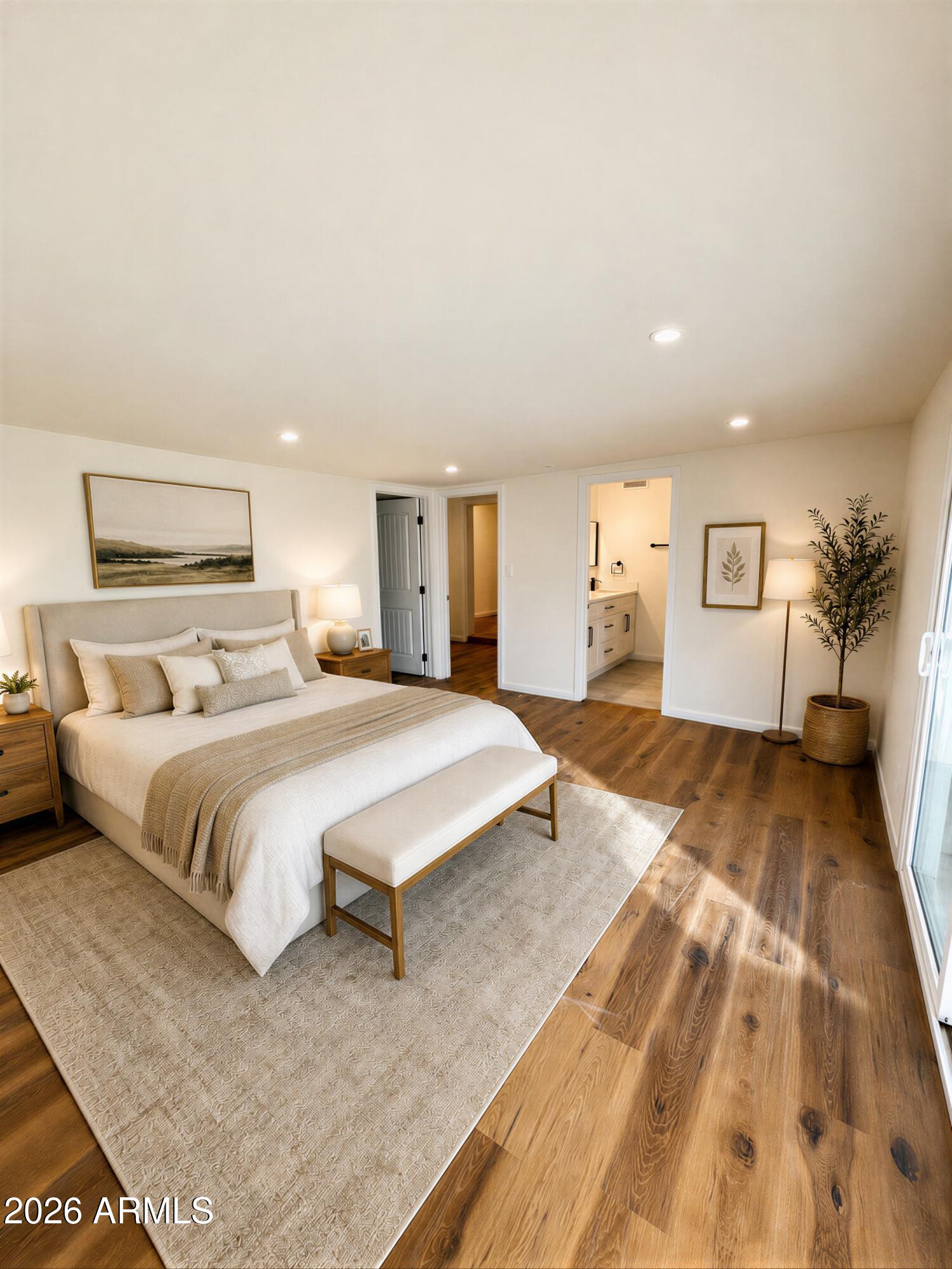 1819 West Morten Avenue Phoenix, AZ 85021 - Photo 3 of 15 a spacious bedroom with a bed and a large mirror