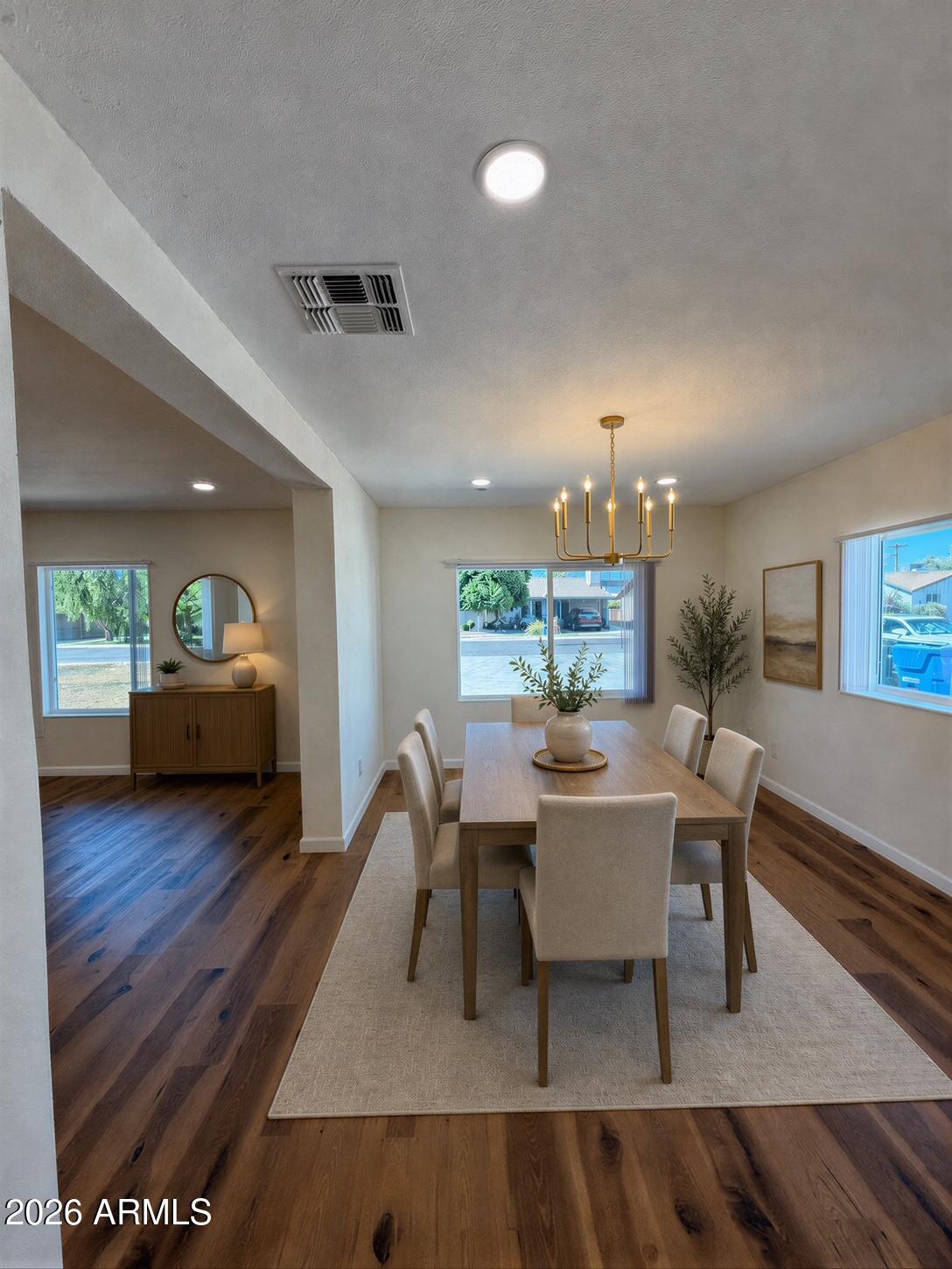 1819 West Morten Avenue Phoenix, AZ 85021 - Photo 10 of 15 a living room with furniture a window and a table