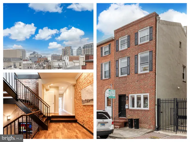 a view of a brick building with a small yard