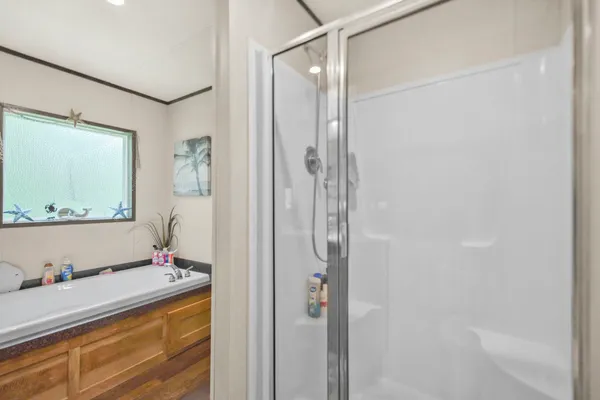 a bathroom with a tub and a sink