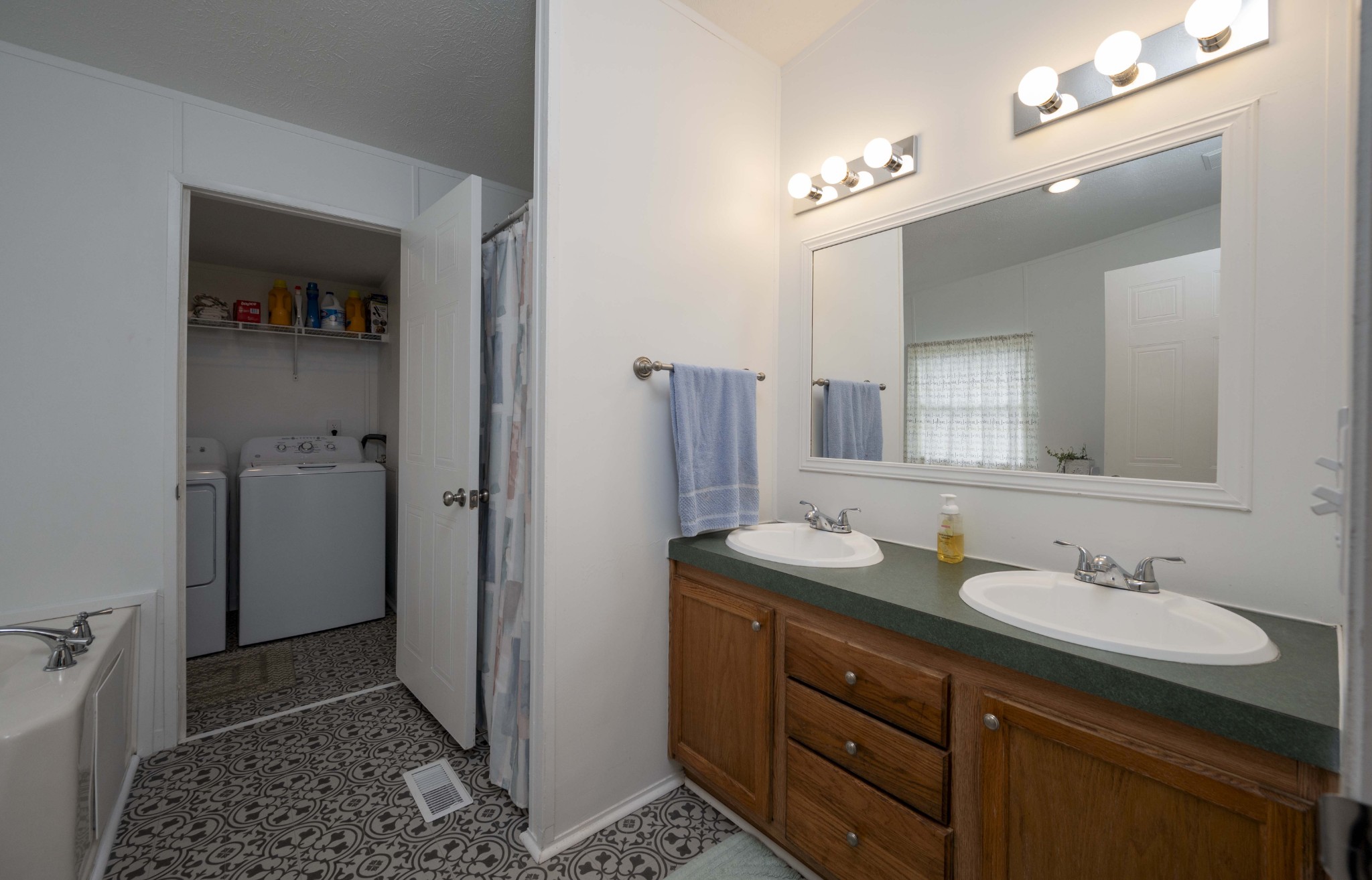 1822 Groveland Ridge Road Columbia, TN 38401 - Photo 24 of 48 a bathroom with a sink a vanity and a mirror