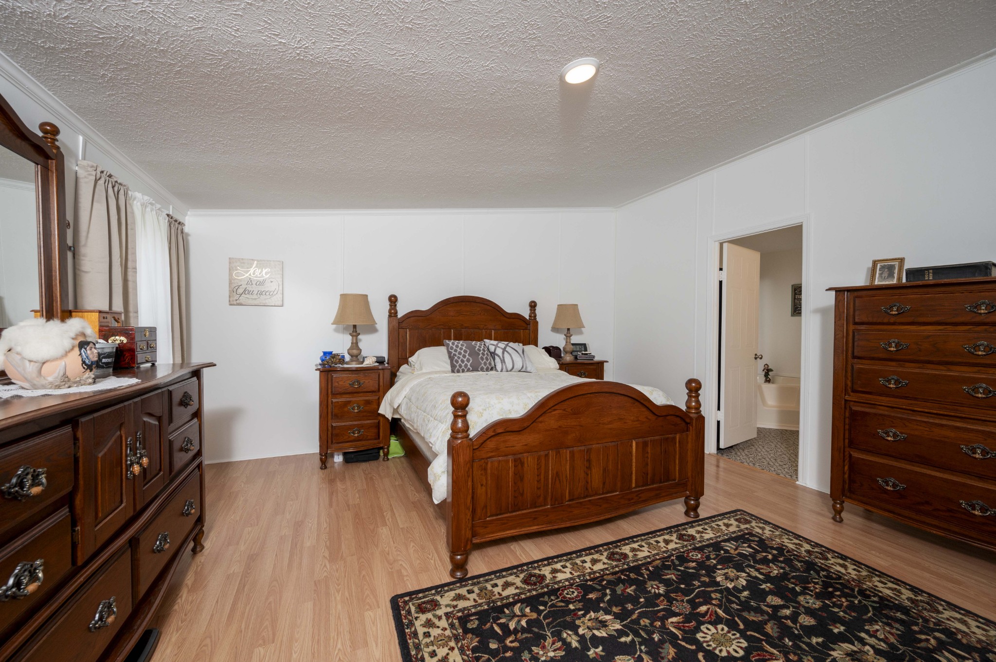 1822 Groveland Ridge Road Columbia, TN 38401 - Photo 26 of 48 a bedroom with a bed and wooden floor