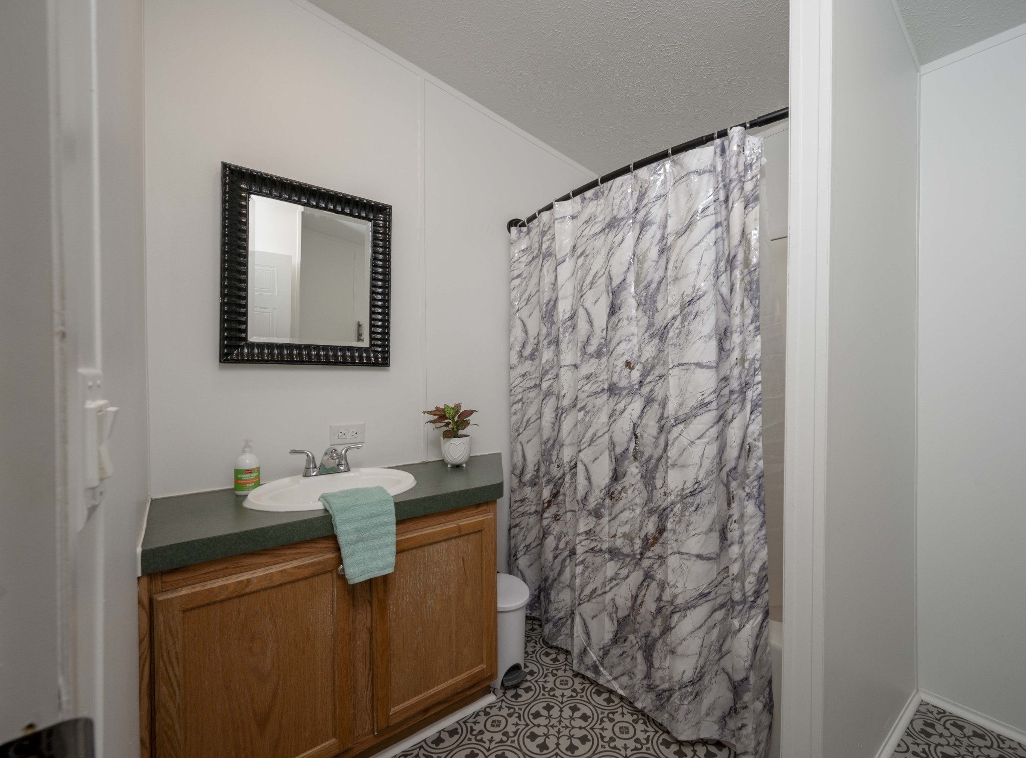 1822 Groveland Ridge Road Columbia, TN 38401 - Photo 30 of 48 a bathroom with a sink toilet and shower