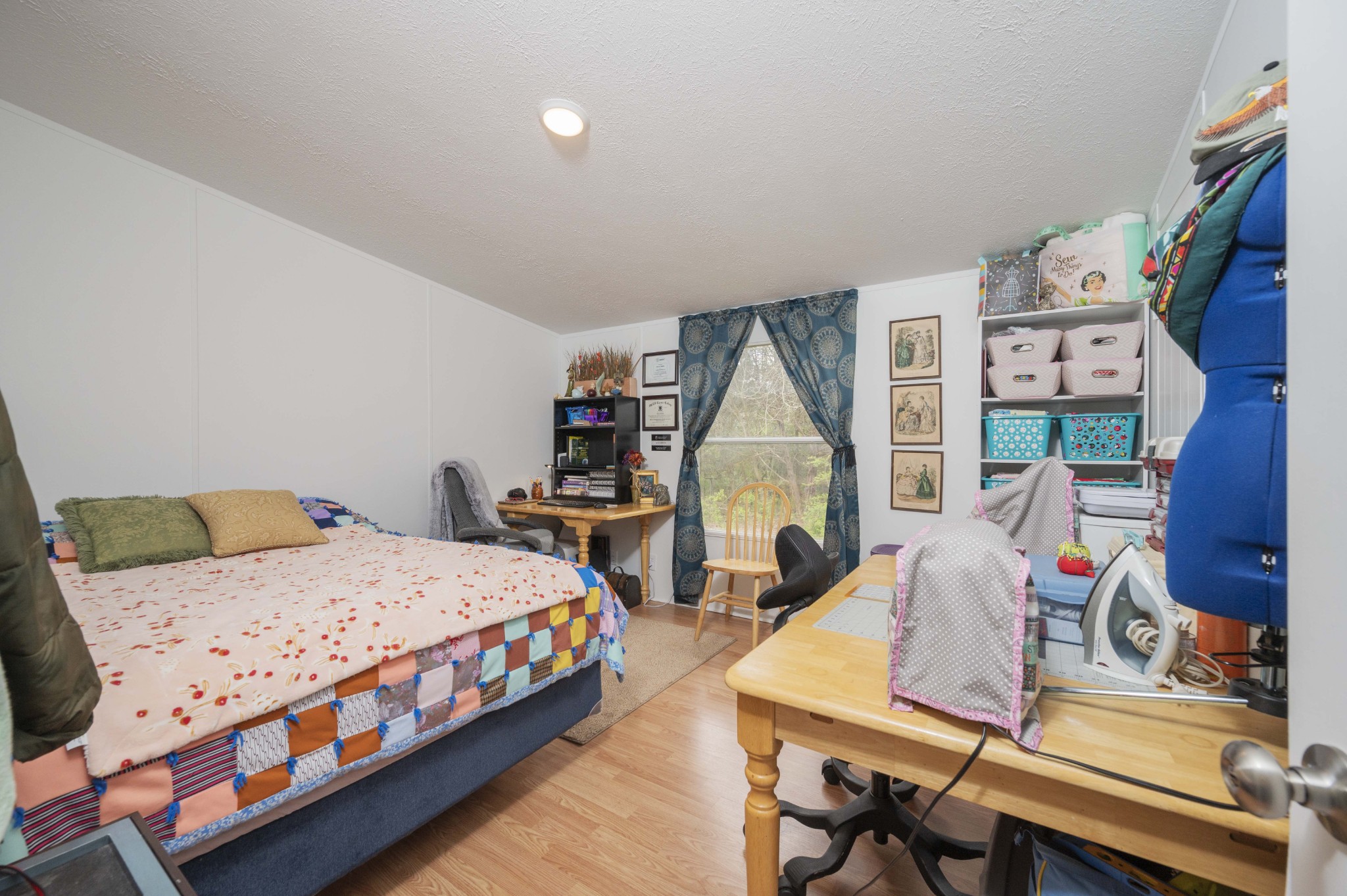 1822 Groveland Ridge Road Columbia, TN 38401 - Photo 33 of 48 a bedroom with a bed and a table in it